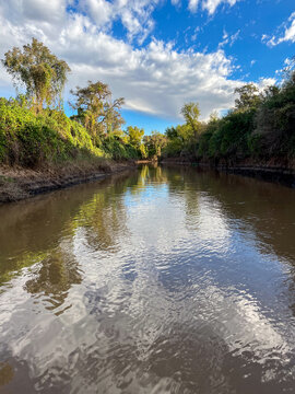 The arm of the Rio Prana near Rosario, sunny afternoon.