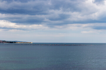 Cloudy view from the Bulgarian Black Sea coast near the Fishing port of Ravda with fishing nets, dalyan in the water, Nesebar municipality, Burgas Province, 