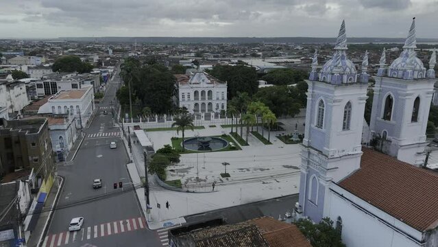 Drone flies toward Pra&ccedil;a dos Mart&iacute;rios and Floriano Peixoto Palace Museum in Maceio, Alagoas, Brazil