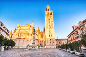 Naklejka premium Seville Cathedral and Giralda Tower at Sunrise, Seville