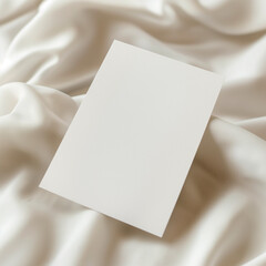 Fototapeta premium Minimalist blank card with dried flowers on white background with copy space.