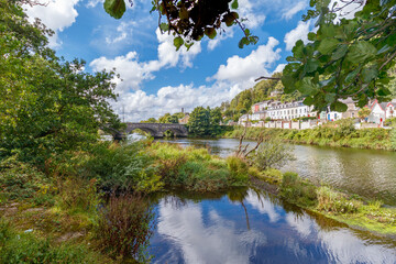 scenic view of urban settlement along river Lee Cork looking from across bank