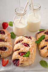 Homemade and sweet strawberry yeast cake as summer snack.
