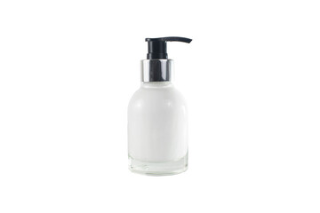 Pump dispenser with a transparent body and a white liquid inside. The pump is black with a silver collar. Container for dispensing liquid soap, lotions or other skin care products.
