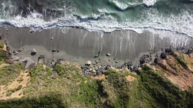 waves on the beach top view fotage from drone 