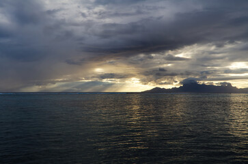 Moorea Island From Tahiti Near Sunset With Cloudy Sky