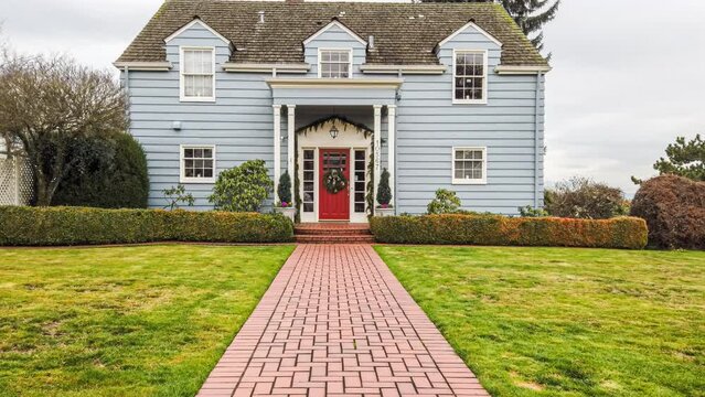 Colonial style suburban home approach; 4k dolly shot