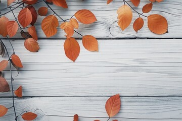 Orange autumn leaves on rustic wooden background, foliage concept