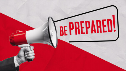Hand Holding Red Megaphone with "Be Prepared" Speech Bubble on Bold Diagonal Red and White Background for Readiness and Alert Campaign