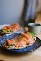 Sourdough toasted with smoked salmon for culinary presentation and healthy meal options.