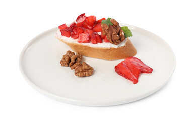 Delicious bruschetta with ricotta cheese, strawberries, mint and walnuts isolated on white