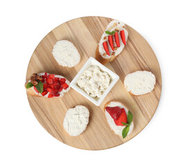 Board with different tasty ricotta bruschettas isolated on white, top view
