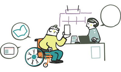 調剤薬局でスマホを使いお薬の管理をする薬剤師と車椅子の男性　ストック素材
