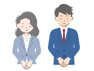 お辞儀をするスーツ姿の男女　上半身