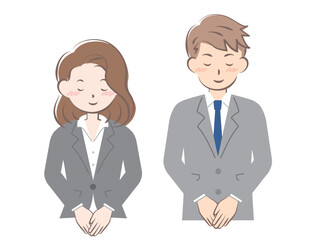 お辞儀をするスーツ姿の男女　上半身