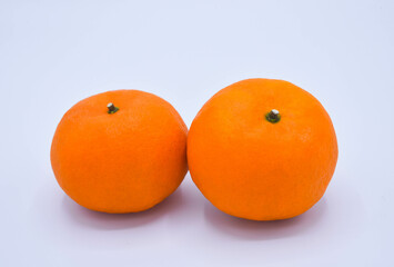 Mandarin fruit isolated on a white background. Organic tangerines fruits.  