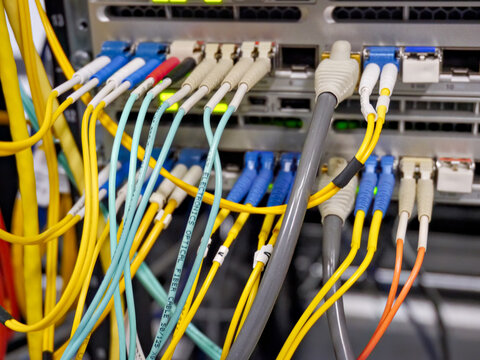 Communication equipment connected with copper and optical cables