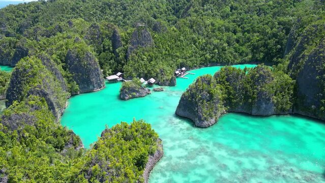 Raja Ampat, Indonesia: Aerial drone footage of the famous Piaynemo viewpoint in the Fam islands in Raja Ampat in west Papua in Indonesia. 