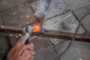 Welding Metal Rods Close-Up