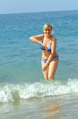 Young woman resting on the sea