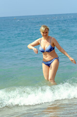 Young woman resting on the sea