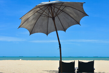 Beach waves of the sea on the sandy beach season Summer on top view background .