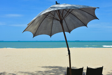 Beach waves of the sea on the sandy beach season Summer on top view background .