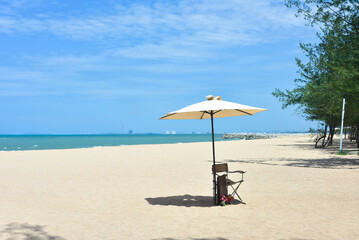 Beach waves of the sea on the sandy beach season Summer on top view background .