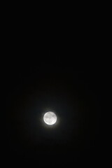 Strawberry moon in the night sky