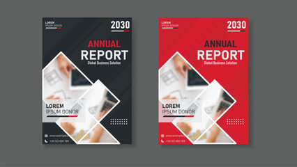 Closeup of red and black annual report covers; suitable for business concept designs, financial presentations, professional marketing materials.