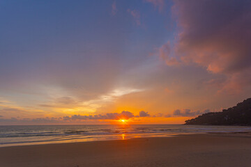 Scenery sweet sky cloud scape in colorful sunset..colorful light through to the cloud above the ocean..Scene of Colorful romantic sky sunset background..An ocean sunset with a sweet sky