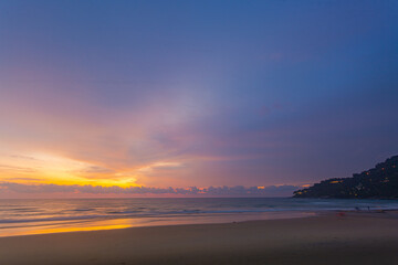 Fototapeta premium Scenery sweet sky cloud scape in colorful sunset..colorful light through to the cloud above the ocean..Scene of Colorful romantic sky sunset background..An ocean sunset with a sweet sky