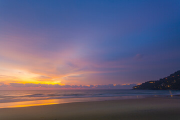 Obraz premium amazing sky at sunset..Scene of Colorful romantic sky sunset with cloud in sweet sky background..colorful clouds moving away rolling. .colorful clouds adorn the sky over the sea.