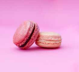 Macaroons, dessert and stack of French sweets with variety, delicacy and treats on studio background. Baked candy, luxury and different flavors of confectionery for bakery, fine dining and cookies