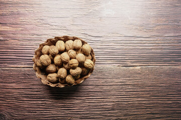 stack of natural walnuts selling at shop 