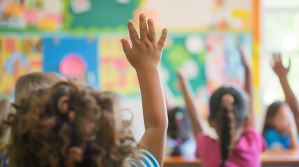 Children raising their hands in an engaging classroom setting.
