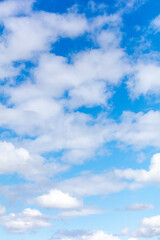 Obraz premium White clouds against a blue sky