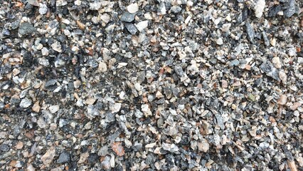 Gravel texture. Crushed gravel texture. Gray stones background.