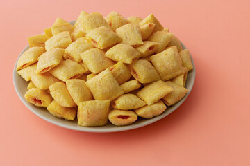 Cookies - corn cushions with strawberry flavored filling in a bowl