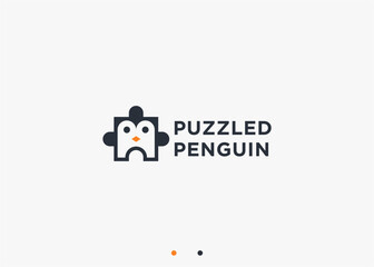 penguin with puzzle logo design vector silhouette illustration