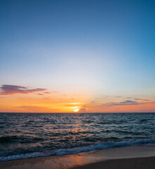 Fototapeta premium Landscape horizon viewpoint vertical summer shore sea beach nobody wind wave cool holiday look calm big sunset sky twilight evening on day time nature tropical coast beautiful ocean water travel