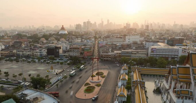 4k An Aerial view Hyperlapse Footage of the Red Giant Swing (Sao Ching Cha) and Suthat Thepwararam Temple, The most famous tourist attraction in Bangkok, Thailand.