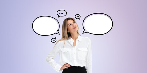 Woman looking at speech bubbles on a light purple background, concept of communication and thinking