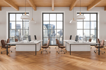 Modern office space with desks and computers, large windows. Wood floor, bright ambiance. Concept of modern workspace, urban office. 3D Rendering