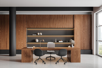 Wooden office interior with work desk and laptop, panoramic window