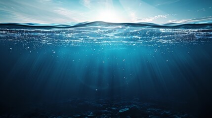 Fototapeta premium Underwater View of Ocean Surface With Sunlight and Bubbles Background