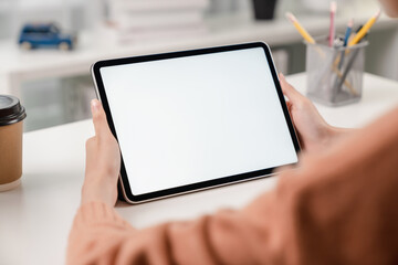 Woman hand using laptop and type on the keyboard, Mockup screen of advertisement.