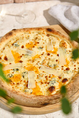 Delicious Quattro Formaggi Pizza in Summer Sunlight with Natural Shadows