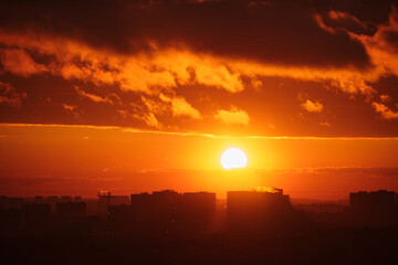 Nature's twilight painted the skyline with shades of red and orange.