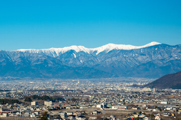 Obraz premium 南アルプスを望む甲府盆地の絶景Spectacular views of the Kofu Basin overlooking the Southern Alps